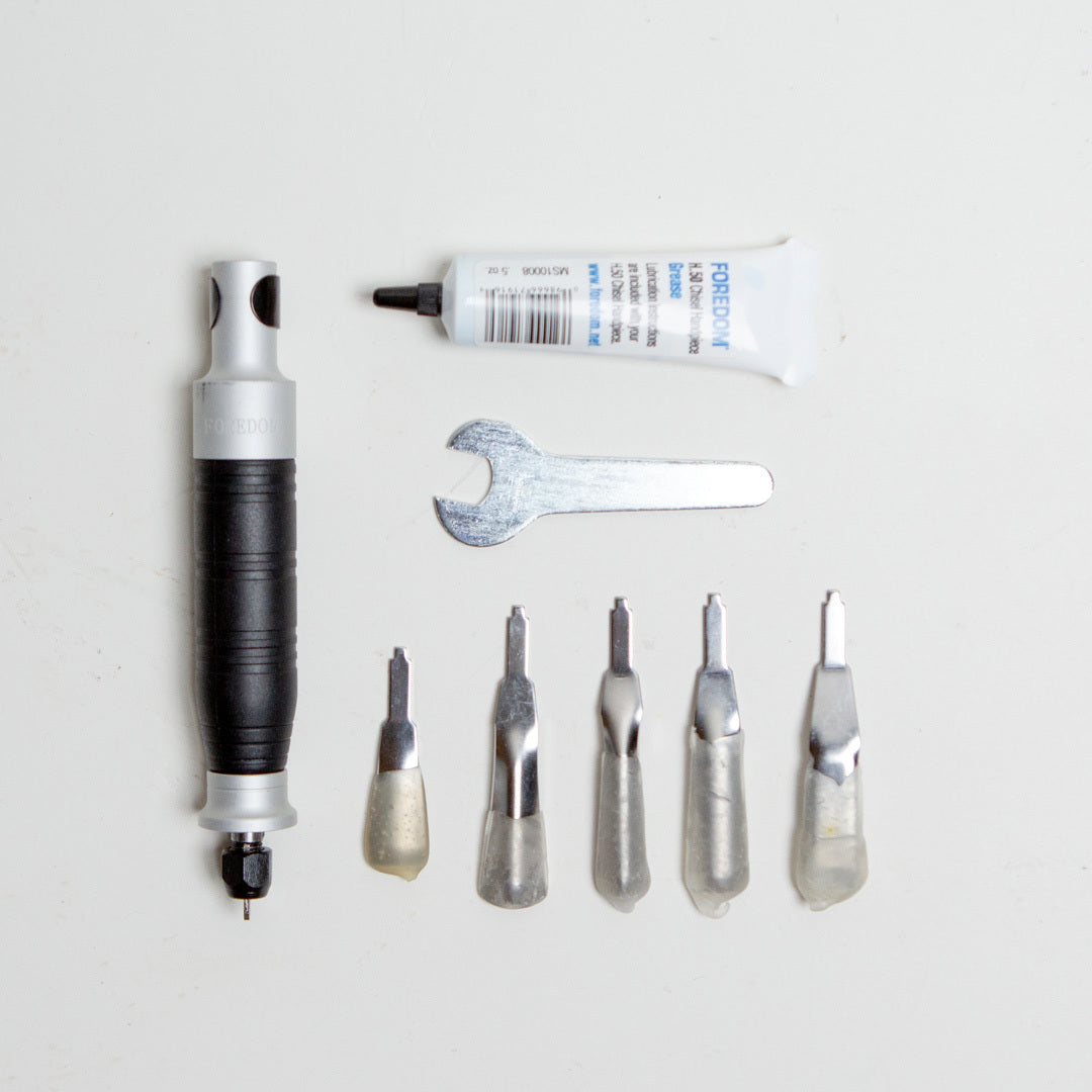 The $125 grafting kit add-on includes:  H.50 chisel handpiece provides hammering action not rotary chiseling. 5 piece chisel set includes 5 large chisels, chisel lubricant and wrench.